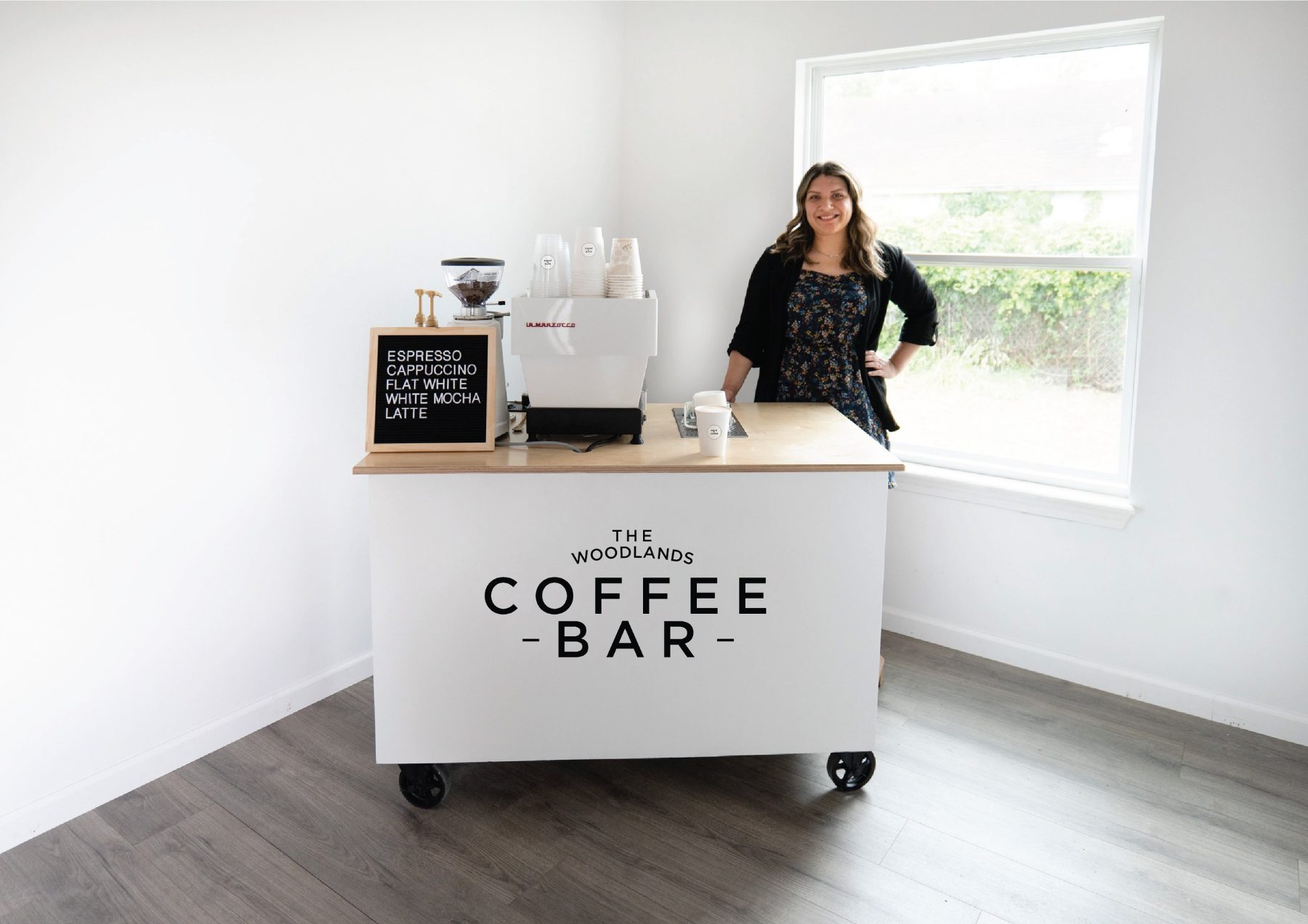 Mobile coffee bar cart with barista