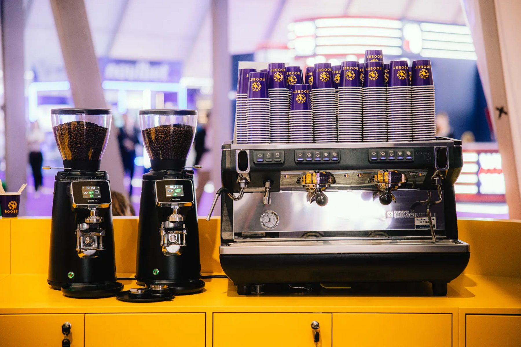 Espresso machine and grinders with branded cups